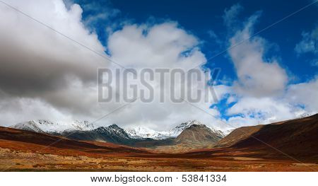 Mountain Glacier With Clouds
