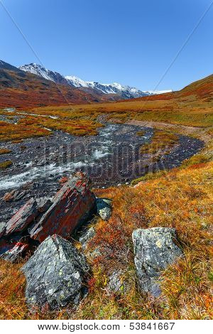 Stones, Mountains, River.