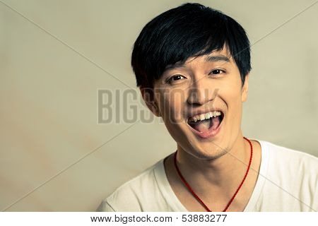 Young man laughing