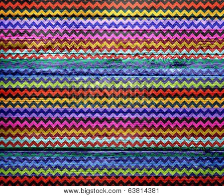 Colorful chevron pattern on wood