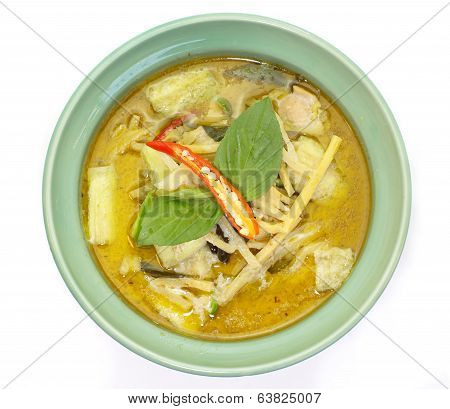 Thai cuisine green curry chicken on white background