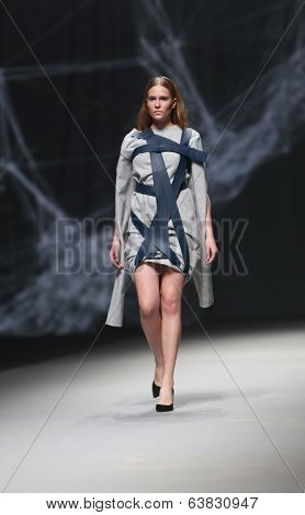 ZAGREB, CROATIA - APRIL 10 : Fashion model wears clothes made by Petra Vuletic and Sasa Hortig on 