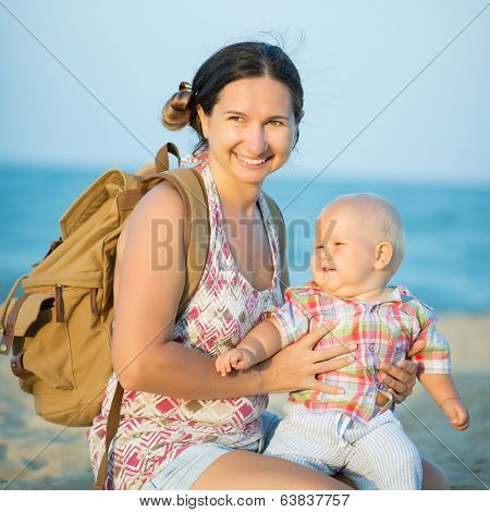 Baby and mother outdoor portrait