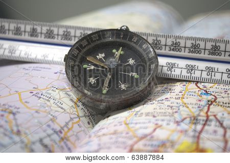 Map, ruler, and compass