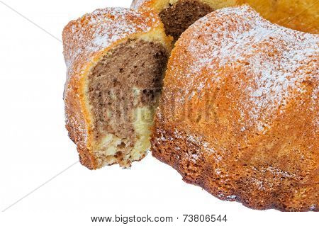 a marble cake for dessert. symbol photo for taxes, duties and shares