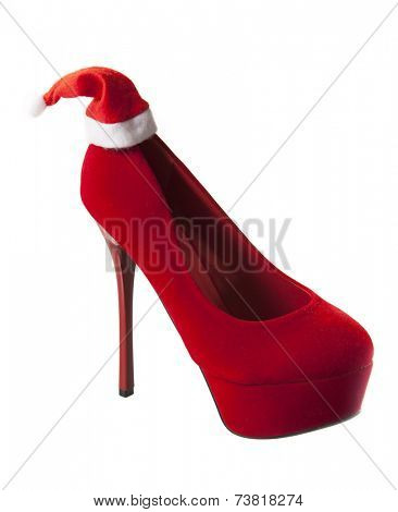 High heels shoe with santa hat.