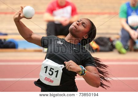 VIENNA, AUSTRIA - JANUARY 28, 2014: Djeneba Toure (#151 Austria) places 4th in women's shut put event in an indoor track and field meeting.