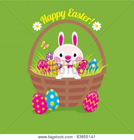 Easter Bunny In A Basket With Easter Eggs On A Green Background