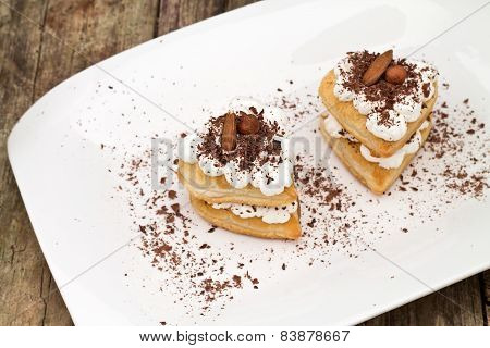 Hearts Of Puff Pastry With Cream And Chocolate