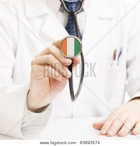 Doctor Holding Stethoscope With Flag Series - Ivory Coast - Republic Of Cote D'ivoire