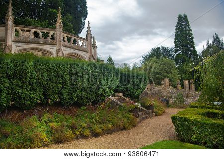 UK, Castle Combe, unique old English village. Old park and garden's decoration