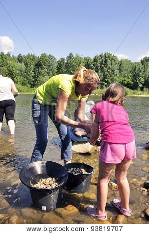 Gold Prospectors Of All Ages On The Banks Of The Gardon River