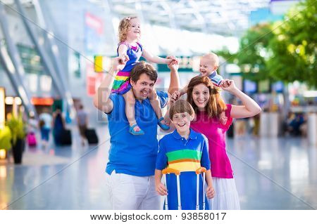 Family With Kids At Airport
