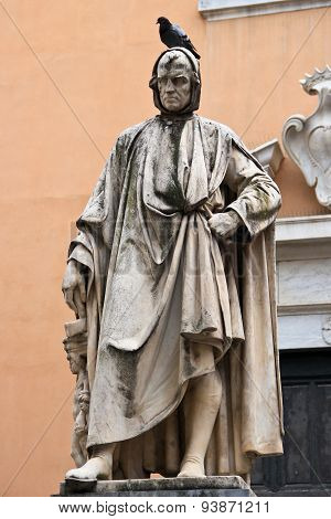 Statue With Pigeon On Top Of Head