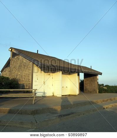 public bathroom at dusk surfiing parking lot Ditch Plains Beach Montauk New York USA