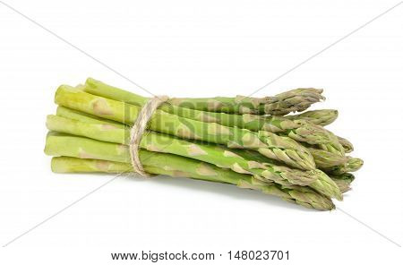 Ripe green asparagus isolated on white background