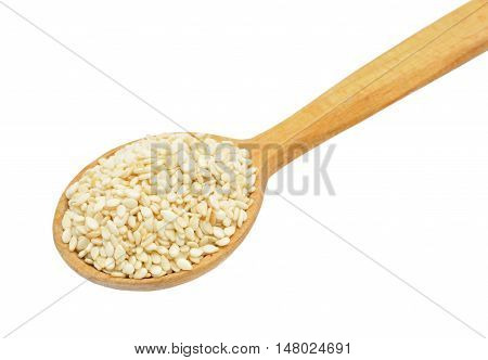 Sesame seeds on wooden spoon isolated on white backgroun