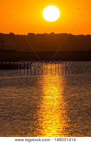 Sunset seascape with boats on the port of Sozopol, Burgas Region, Bulgaria