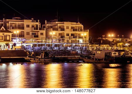 Traditional Greek Fish Restaurant At Zygi Village At Night. Larnaca District Cyprus.