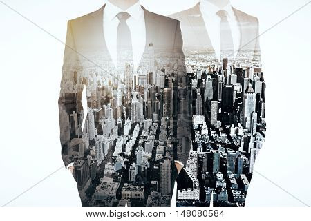 Businesspeople On City Background Multiexposure