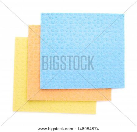 Stack of new kitchen cleaning napkin rags over white isolated background