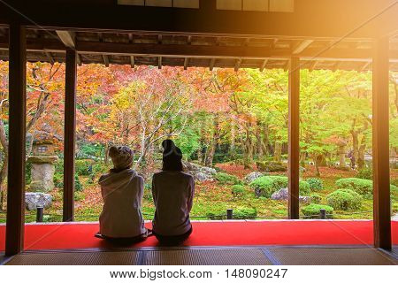 Japanese Girls In Enkoji Temple Enjoy Autumn Colorful Garden