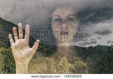 double exposure a woman behind the window