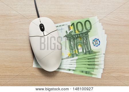 Computer Mouse And Euro Banknotes