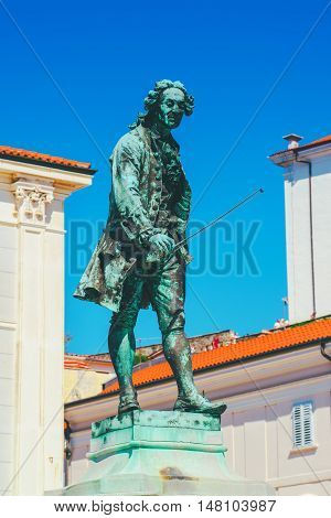 PIRAN SLOVENIA - AUGUST 27 2016: Statue of violinist and composer Giuseppe Tartini on the Tartini Square in Piran Slovenia