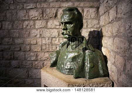 POLAND, KRAKOW - MAY 27, 2016: Bust of Jozef Pilsudski near his grave in Wawel castle. Jozef Pilsudski was a polish statesman, Chief of State (1918-22), 