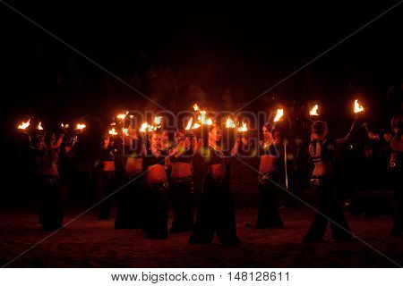 RUSSIA, BALTIYSK - JULY 06, 2014: The unknown artists demonstrate the fire show at the open festival BALTIC FIRE FEST 2014 on july 06, 2014 in Baltiysk, Kaliningrad region.