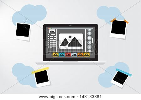 Laptop Icon with photo frame on blue clouds