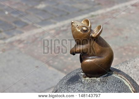 LITHUANIA, KLAIPEDA - MAY 25, 2014: Sculpture Wonderful little mouse is oldtown Klaipeda. Lithuania. One of the most famous sculptures in the city.