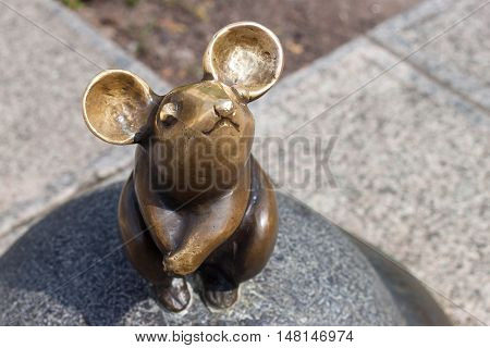 LITHUANIA, KLAIPEDA - MAY 25, 2014: Sculpture Wonderful little mouse is oldtown Klaipeda. Lithuania. One of the most famous sculptures in the city.