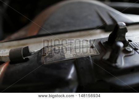 MALAYSIA - August 15, 2016: An engine compartment of a classic car Mercedes Benz 200e is photographed during a day in Malaysia, August 15, 2016.
