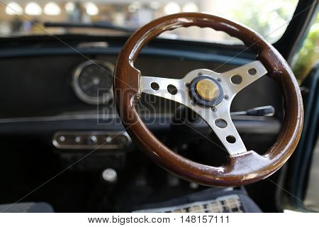 MALAYSIA - August 15, 2016: A classic car Mini Austin 850 interior and steering is photographed in Malaysia, August 15, 2016.