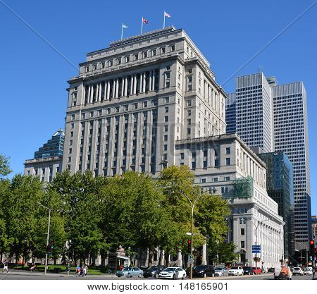 MONTREAL QUEBEC CANADA 09 17 2016: Sunlife building in Montreal canada.The Sun Life Building is an historic office building at 1155 Metcalfe Street. Place ville Marie in background.