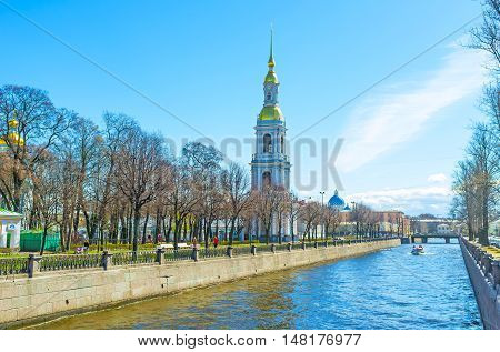 ST PETERSBURG RUSSIA - APRIL 25 2015: The bell tower of Maritime Cathedral of St Nicholas (Sailors' Cathedral) rises on the bank of Krukov Canal on April 25 in St Petersburg.