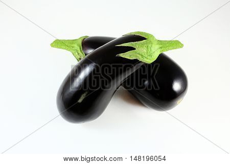 Fresh Healthy Eggplants On White Background.