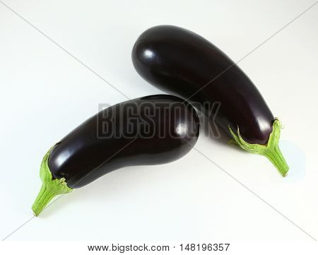 Fresh Healthy Eggplants On White Background.