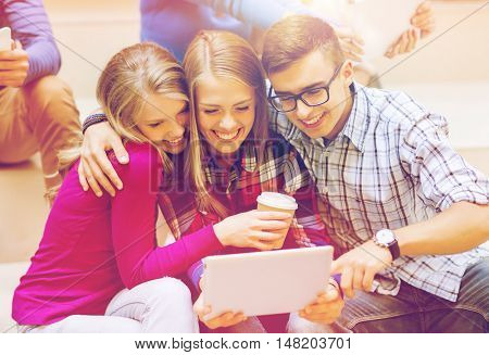 education, friendship, technology, drinks and people concept - group of smiling students with tablet pc computer and paper coffee cup taking selfie or video