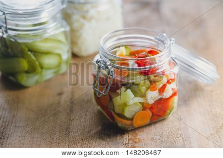 Pickled vegetables in glass jars