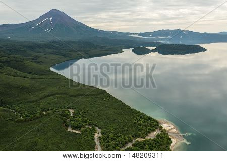 Kurile lake and Ilyinsky volcano. South Kamchatka Nature Park. View from the helicopter.