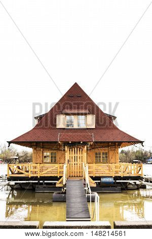 Wooden House On River
