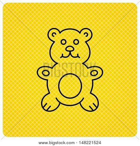 Teddy-bear icon. Baby toy sign. Plush animal symbol. Linear icon on orange background. Vector