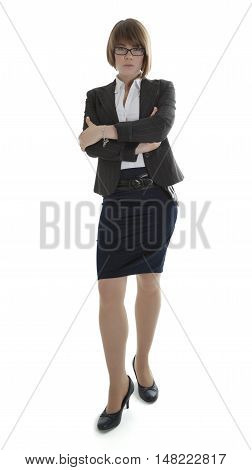Young businesswoman standing with arms crossed on white