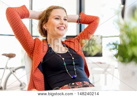 Young woman in office