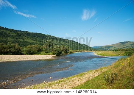 the river flows through mountains Carpathians in Ukraine