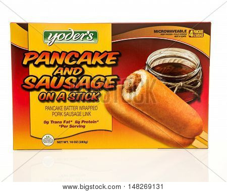 Winneconne WI - 12 August 2016: Box of Yoder's pancake and sausge on a stick on an isolated background.