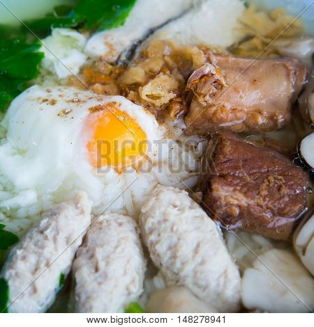 Rice porridge with  pork and egg for breakfast